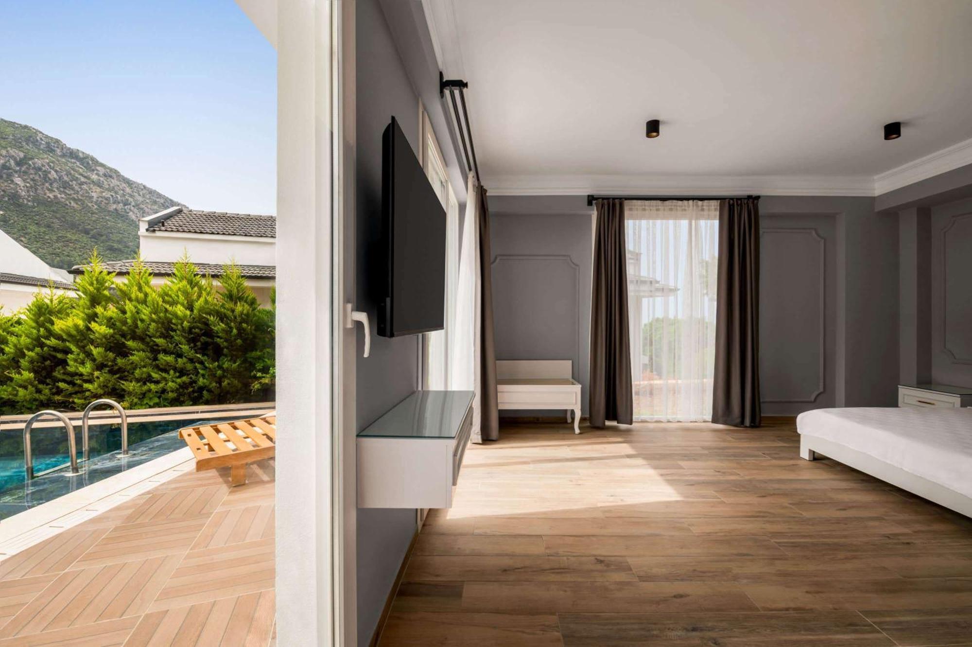 Отель Ramada By Wyndham Fethiye Oludeniz Adult Only Экстерьер фото