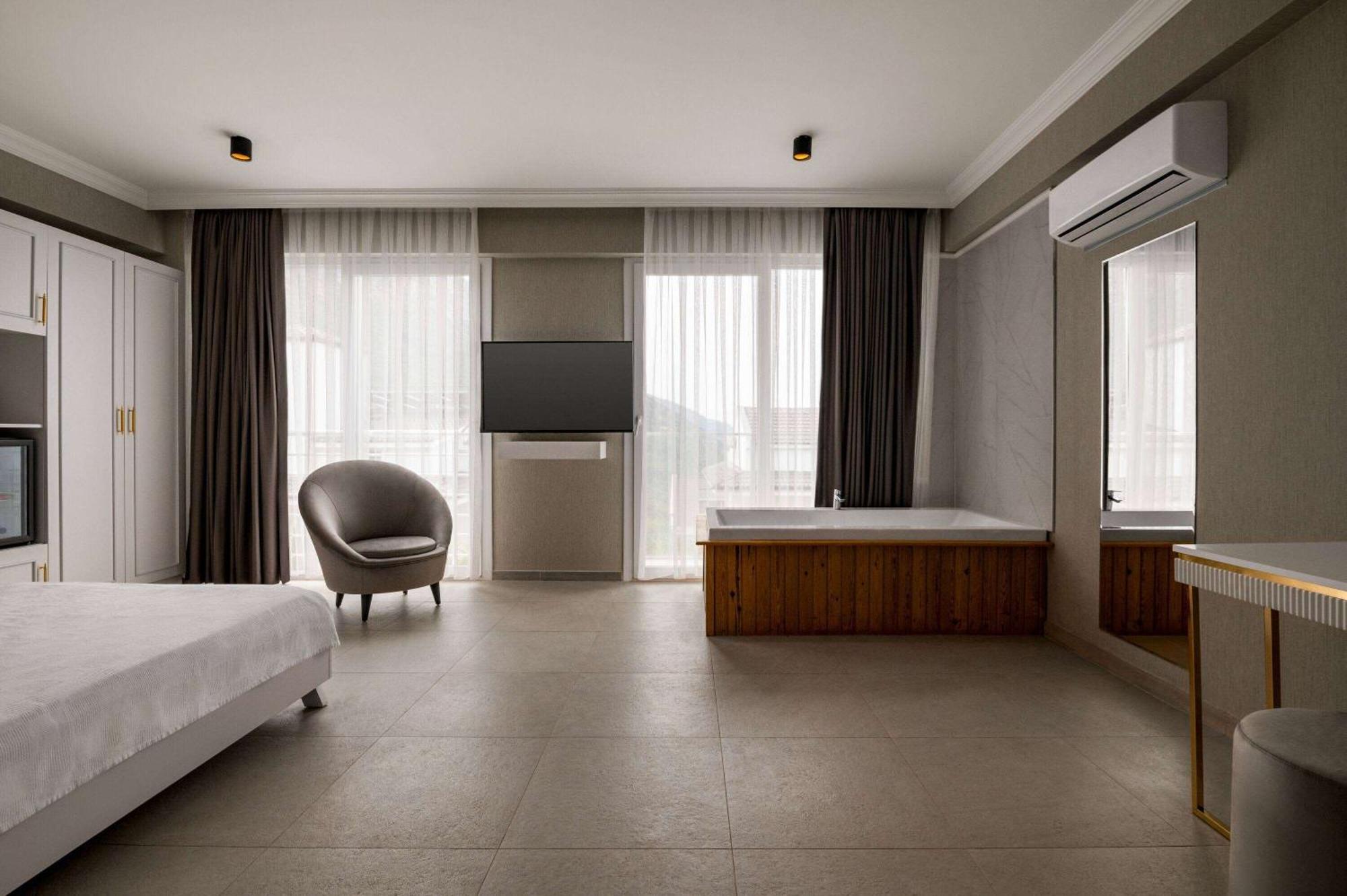 Отель Ramada By Wyndham Fethiye Oludeniz Adult Only Экстерьер фото